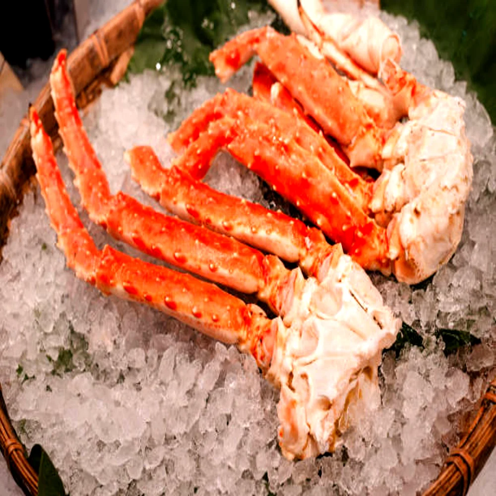 Fresh king crab legs on ice ready for wholesale seafood distribution